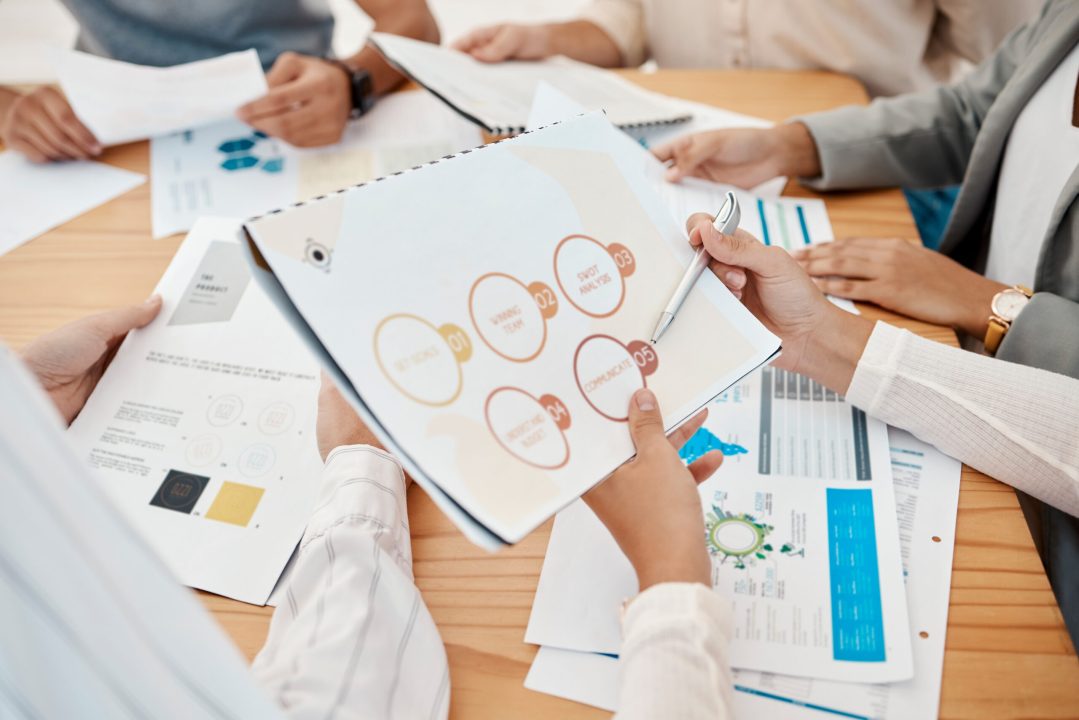 Financial audit, progress report and documents in meeting, startup team working on business growth .